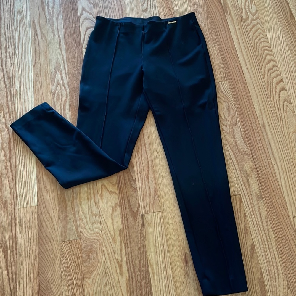Black stretch slim ankle jogging with seam detailing on front. Anne Klein.